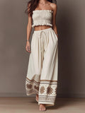 Boho Two Piece Outfit: Ruffle Smocked Tube Crop Top & Floral Border Print Wide Leg Palazzo Pants Set